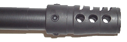 A side view of the Olympic Arms muzzle brake.