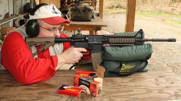 Dave workman behind an Oly Arms Carbine